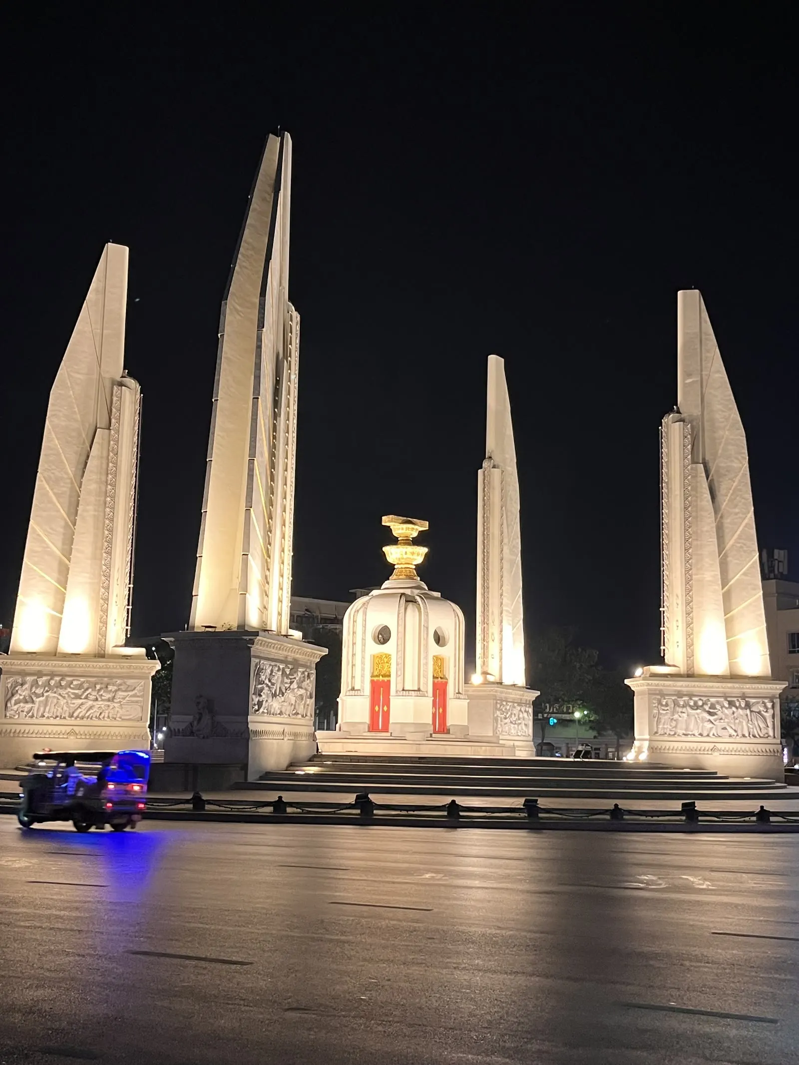 Democracy Monument in Bangkok, lit up at night