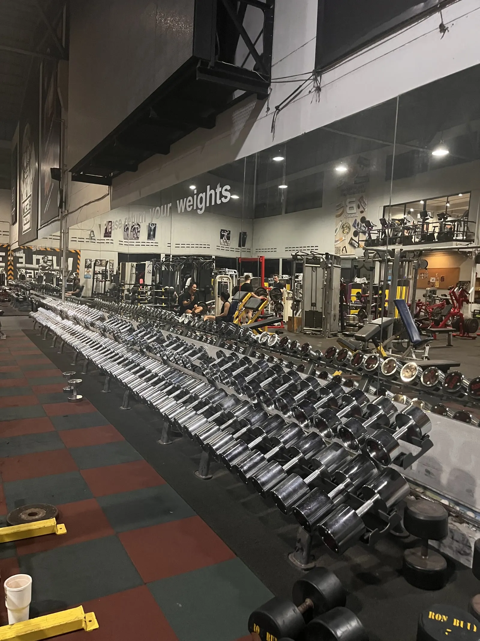 Rows of dumbbells in a large gym